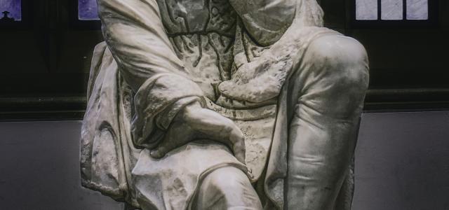 woman in dress statue in grayscale photography by K. Mitch Hodge courtesy of Unsplash.